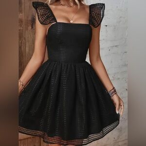 Elegant Black Dress with Mesh Details